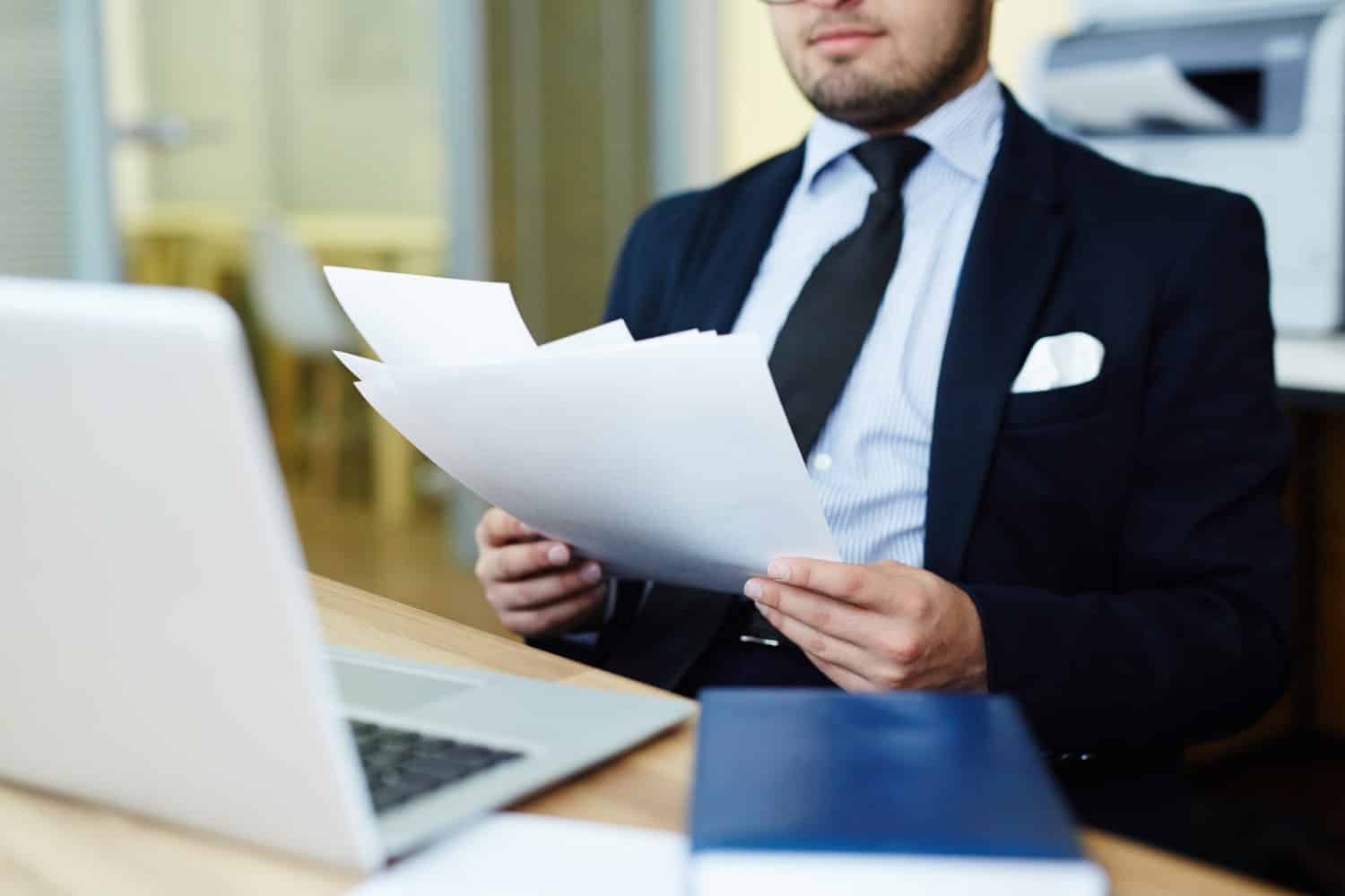 Registry of Moneylender reading document