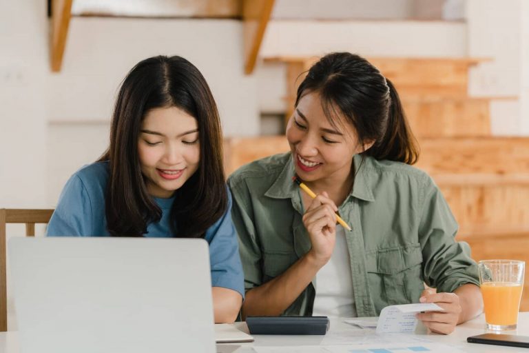 Asian woman looking for reasons for a personal loan